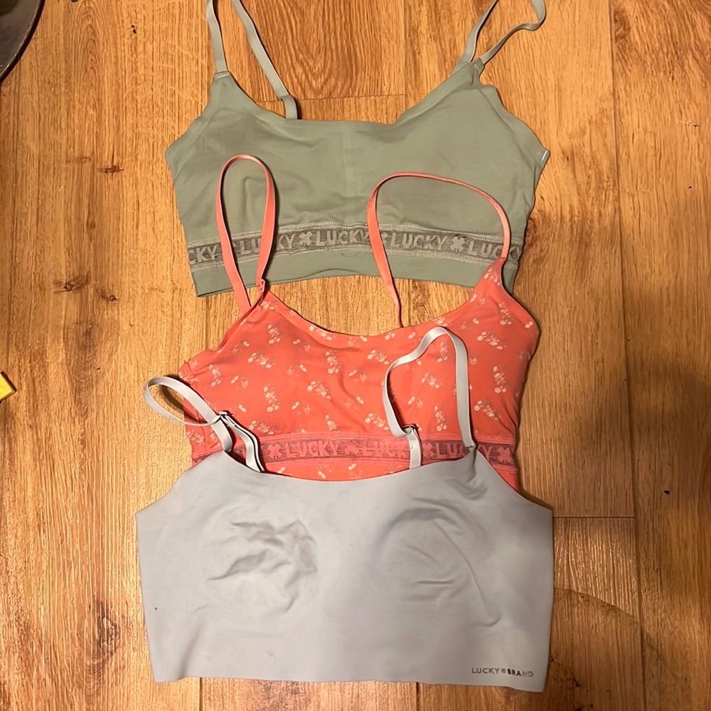 3 Lucky Brand bras two with removable pads size medium, one no pads size large